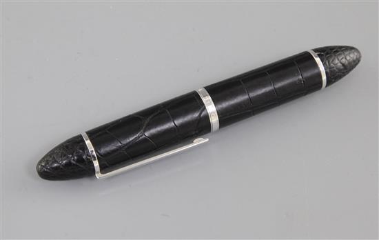 A Louis Vuitton Ltd edition black crocodile skin fountain pen with 18ct white gold nib.